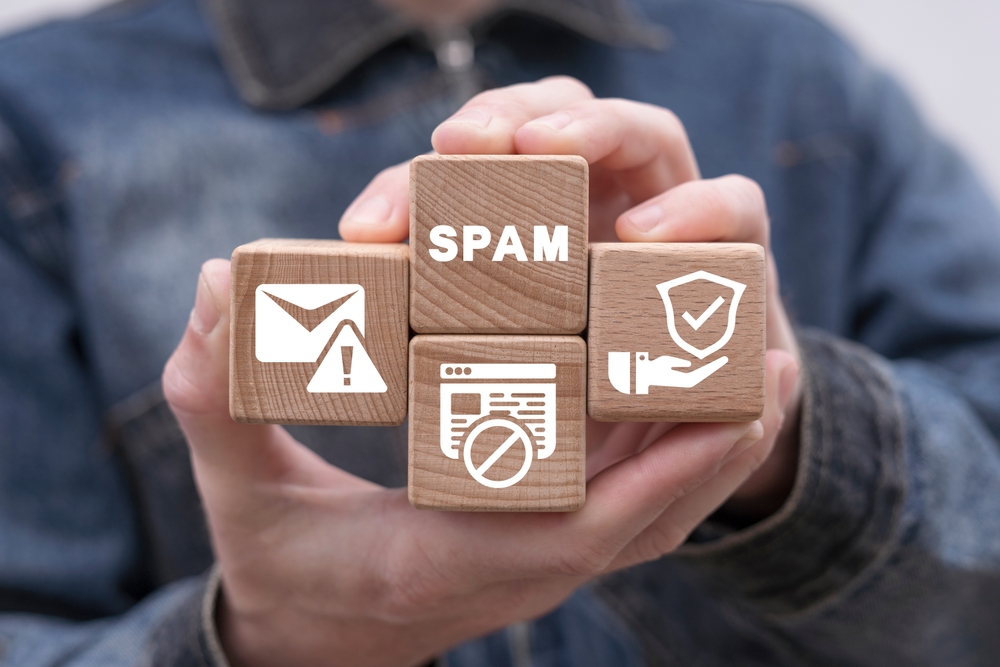 Man,Holding,Wooden,Cubes,Sees,Word:,Spam.,Spam,Email,Internet